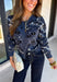 Add a touch of western-inspired charm to your fall wardrobe with this beautifully detailed cardigan from Sunday Edition. Designed in a soft dusty blue knit, this cozy button-down sweater features a vintage-inspired bandana print with cream and black floral and western detailing for a look that's both timeless and unique. Ribbed trim along the neckline, cuffs, and hem creates a polished finish, while the soft knit blend makes it the perfect layering piece for crisp autumn days.