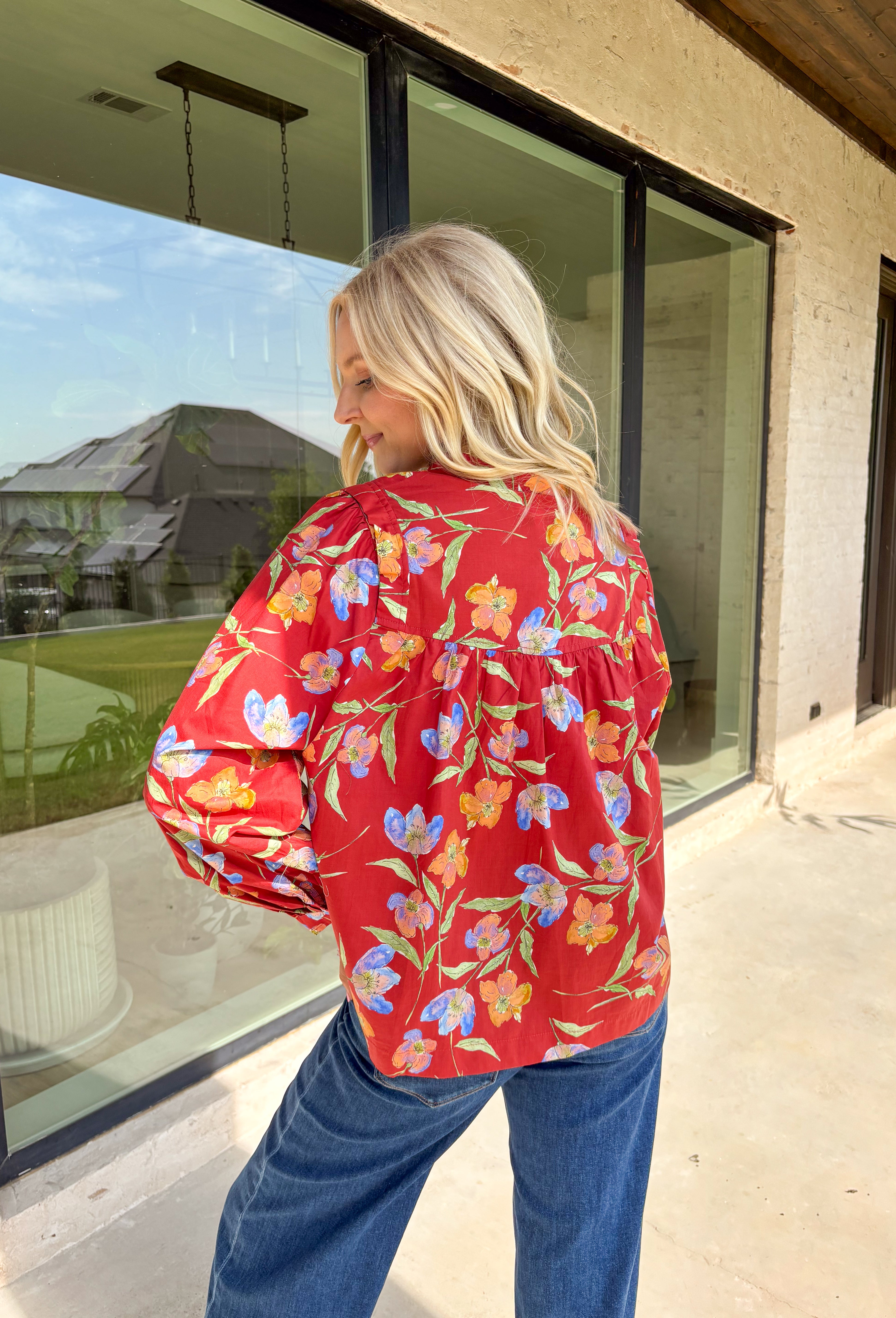 This autumn-ready floral blouse brings all the charm of the season in one lightweight layer. With its rich botanical print and crisp collar, this top feels timeless but with an elevated twist thanks to the hidden button placket and cuff band long sleeves. It’s a closet staple you'll be reaching for from pumpkin spice runs to Thanksgiving dinner.