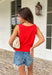 Add a pop of bold spring color to your closet with this red button down sweater tank by Wishlist! The open knit texture keeps it light and breathable, while the button-front design makes it easy to style solo or layered over a simple cami. Finished with the cutest scalloped hem and a tie detail at the bottom, this piece gives you that “effortlessly put together” look with just the right amount of playful charm. Pair it with light wash denim for an easy daytime outfit.