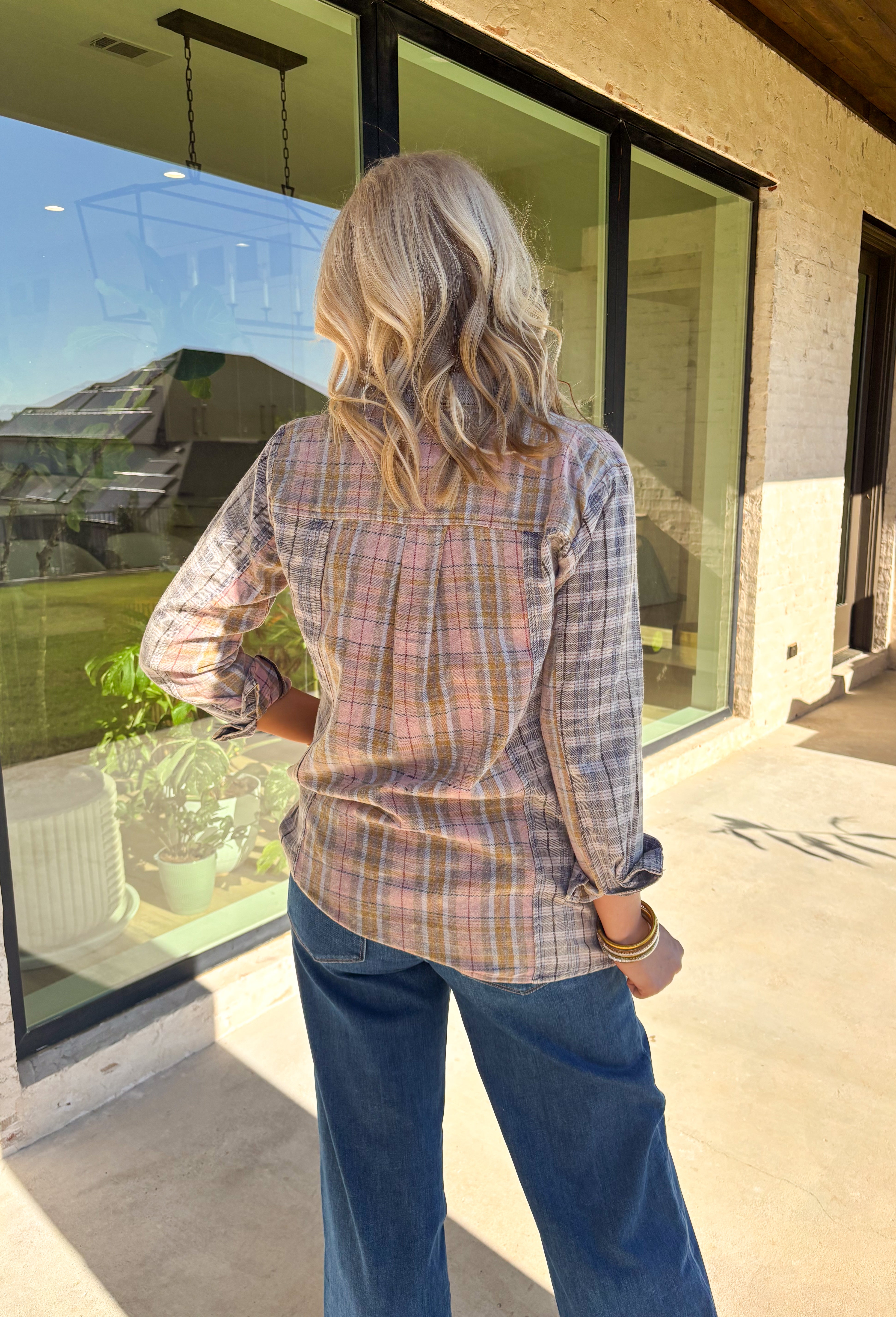 A timeless favorite with a cozy fall twist—this plaid flannel by Mystree is as versatile as it is comfortable. Designed in a mix of neutral shades with subtle pops of gray, light pink, light blue, tan, and off-white, it’s easy to pair with just about anything in your closet. The button-down design and collared neckline keep it classic, while the 100% cotton fabric makes it breathable and soft for all-day wear. Perfect for layering or styling solo, this flannel will be your go-to through the season.
