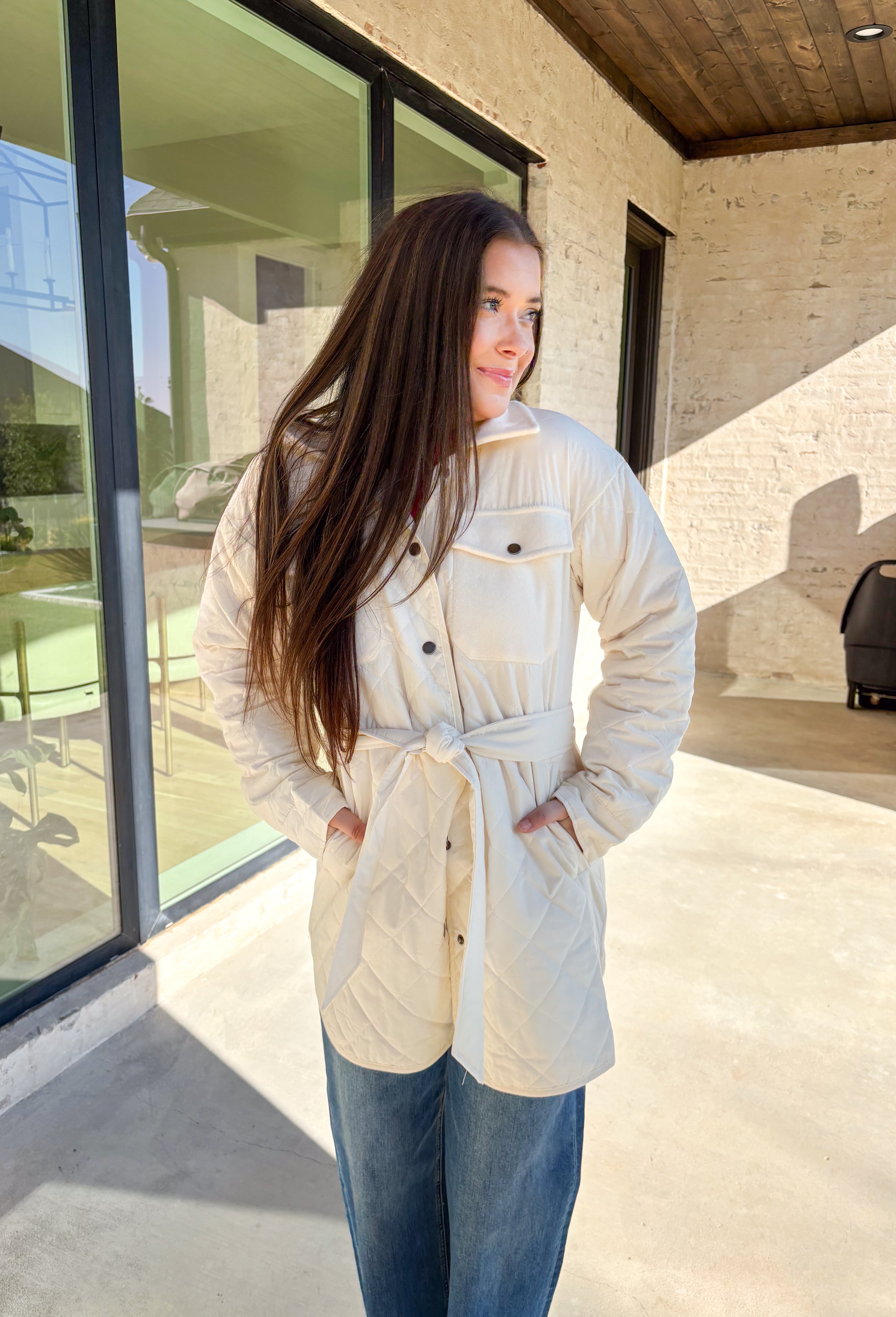 Bundle up in comfort with this off-white jacket by Mystree, the perfect balance of cozy and chic. The quilted front and sleeves bring texture and warmth, while the back is crafted from soft microfleece for that extra snug feel. Designed with both style and function in mind, it features a button-down front, self-tie waist for a flattering fit, and plenty of pockets—including two microfleece-lined front pockets and hidden side pockets. Lightweight yet warm, this jacket is your go-to layer for chilly winter da