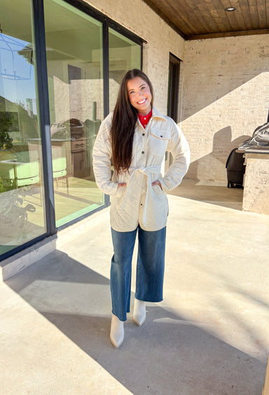 Bundle up in comfort with this off-white jacket by Mystree, the perfect balance of cozy and chic. The quilted front and sleeves bring texture and warmth, while the back is crafted from soft microfleece for that extra snug feel. Designed with both style and function in mind, it features a button-down front, self-tie waist for a flattering fit, and plenty of pockets—including two microfleece-lined front pockets and hidden side pockets. Lightweight yet warm, this jacket is your go-to layer for chilly winter da