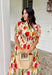 Bright blooms and easy details make this neutral short sleeve midi dress by Entro a spring favorite. Featuring a bold tulip floral print with vibrant pops of red, green, and orange, it brings cheerful color to a soft, wearable base. Puff sleeves add a feminine touch, while the front zipper closure gives it a modern, effortless feel. An elastic waist creates a flattering fit, and the full lining keeps it comfortable all day long. This is the kind of dress that does all the work—just add sunshine.