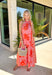 This pink floral midi dress is the definition of a standout summer moment! Featuring a bold tomato red and white floral print, it brings the perfect pop of color while still feeling feminine and easy to wear. The halter tie neckline adds a flattering, elevated touch, and the stripe detailing along the sides gives it that extra something special. Lightweight and lined for comfort (with pockets, too), it’s perfect for everything from vacation dinners to summer events. 