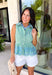 This green and white stripe top is such a fresh and fun piece for summer! The classic stripe print keeps it easy to style, while the light blue floral eyelet embroidery along the scalloped hem adds the prettiest, unexpected detail. The peplum silhouette creates a flattering, feminine shape, and the collared neckline with button front gives it that polished finish. Lightweight and breathable, it’s perfect for warm days when you want to feel put together without overthinking it. 
