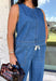 Double denim has never been easier with this matching two-piece set from Tres Bien. The sleeveless medium wash denim top features contrasting tan stitching throughout, giving the classic denim look a little extra detail. Coordinating wide leg jeans complete the set with an easy, relaxed silhouette, while the elastic waistband and adjustable self-tie detail keep the fit comfortable throughout the day. 