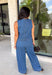 Double denim has never been easier with this matching two-piece set from Tres Bien. The sleeveless medium wash denim top features contrasting tan stitching throughout, giving the classic denim look a little extra detail. Coordinating wide leg jeans complete the set with an easy, relaxed silhouette, while the elastic waistband and adjustable self-tie detail keep the fit comfortable throughout the day. 