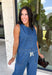 Double denim has never been easier with this matching two-piece set from Tres Bien. The sleeveless medium wash denim top features contrasting tan stitching throughout, giving the classic denim look a little extra detail. Coordinating wide leg jeans complete the set with an easy, relaxed silhouette, while the elastic waistband and adjustable self-tie detail keep the fit comfortable throughout the day. 