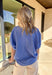 Soft, breezy, and effortlessly polished, this chambray dolman top by Entro is the perfect spring go-to. The relaxed dolman silhouette gives it an easy, flowy fit, while the v-neck accent with trenza detailing adds a subtle touch of texture that elevates the whole look. Lightweight and breathable, it’s an effortless piece that works for everyday wear, from casual errands to lunch plans.