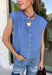 Layering season calls for pieces that can keep up with changing temperatures, and this blue sleeveless cardigan from Double Zero is ready for just that. The cozy knit brings plenty of texture and warmth, while the sleeveless design makes it easy to wear alone on milder days or layer over a long sleeve top as winter gets closer. A button-down front gives you multiple ways to style it, and the ribbed hem adds a classic sweater finish.