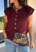 Layering season calls for pieces that can keep up with changing temperatures, and this dark cherry sleeveless cardigan from Double Zero is ready for just that. The cozy knit brings plenty of texture and warmth, while the sleeveless design makes it easy to wear alone on milder days or layer over a long sleeve top as winter gets closer. A button-down front gives you multiple ways to style it, and the ribbed hem adds a classic sweater finish. 