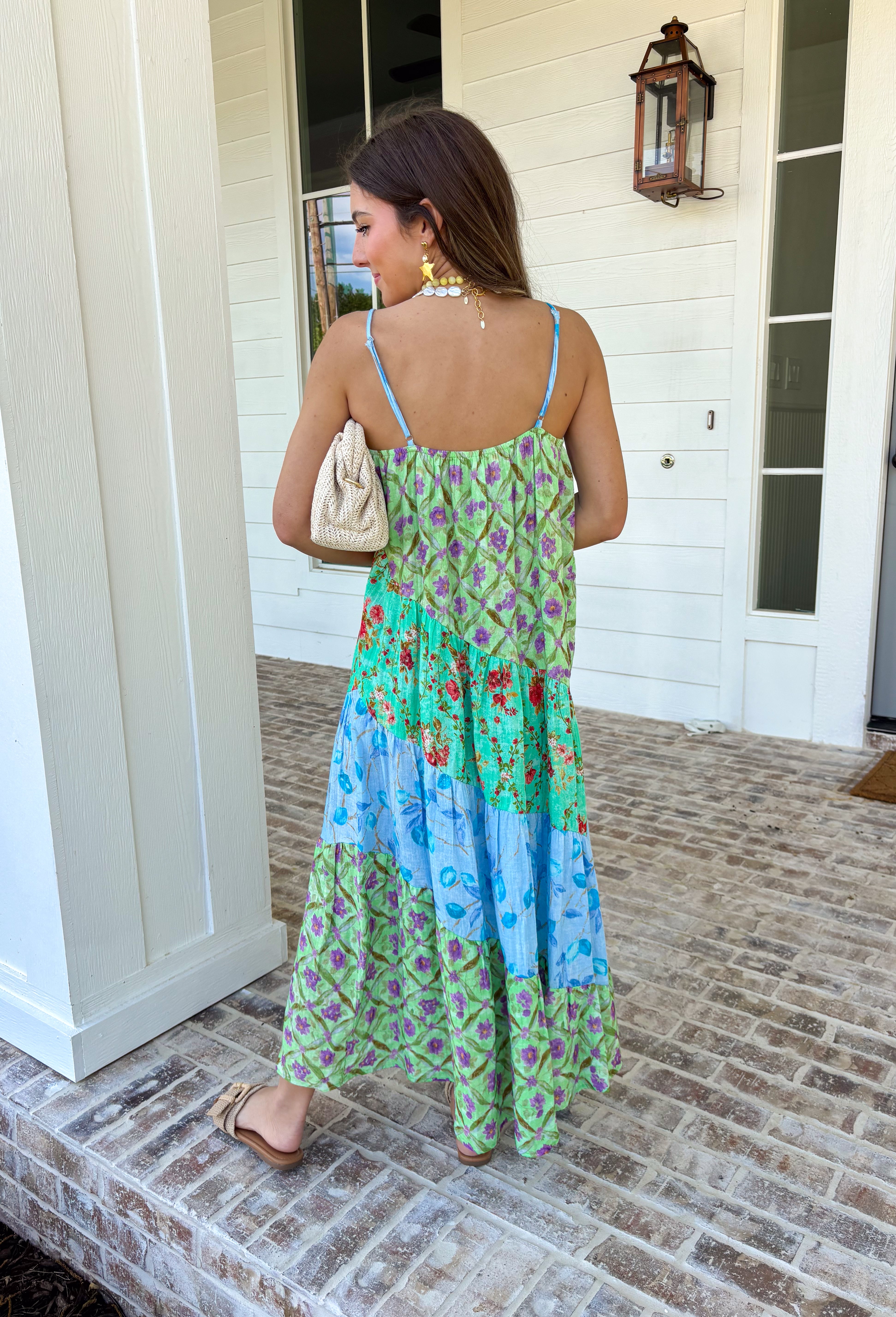 This tiered color block midi dress is made for sunshine-filled days and standout summer moments! Featuring a mix of green, purple, and blue with a floral print, it brings the perfect pop of color while still feeling easy and wearable. The tiered design gives it a flowy, flattering shape, and the adjustable straps with a v-neckline keep the fit comfortable and customizable. Lightweight in 100% cotton, it’s perfect for staying cool while looking put together.
