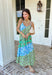 This tiered color block midi dress is made for sunshine-filled days and standout summer moments! Featuring a mix of green, purple, and blue with a floral print, it brings the perfect pop of color while still feeling easy and wearable. The tiered design gives it a flowy, flattering shape, and the adjustable straps with a v-neckline keep the fit comfortable and customizable. Lightweight in 100% cotton, it’s perfect for staying cool while looking put together.