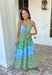 This tiered color block midi dress is made for sunshine-filled days and standout summer moments! Featuring a mix of green, purple, and blue with a floral print, it brings the perfect pop of color while still feeling easy and wearable. The tiered design gives it a flowy, flattering shape, and the adjustable straps with a v-neckline keep the fit comfortable and customizable. Lightweight in 100% cotton, it’s perfect for staying cool while looking put together.
