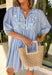 Light, airy, and full of pretty details! This light blue dress features a soft white stripe print throughout, paired with delicate floral embroidery along the top for a sweet, feminine touch. Subtle gold and silver tinsel threading adds just the right hint of shimmer, catching the light in the prettiest way. Designed with 3/4 length sleeves and elastic cuffs, this dress offers a comfortable and flattering fit. 