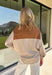 Get the polished look of layering without any extra effort in this chic top from Hyfve. Designed with a classic camel and white striped button-down base, this unique piece features a camel ribbed sweater overlay for a perfectly styled layered look in one easy top. The collared neckline and front pocket add timeless appeal, while the lightweight fabric keeps it comfortable for all-day wear. 