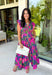 Bring a beautiful blend of color to your fall wardrobe with this eye-catching abstract print midi dress. Designed with a vibrant mix of autumn-inspired hues, this dress offers the perfect balance of playful style and timeless elegance. The flattering v-neckline is accented by a front zipper closure for a modern touch, while the defined waistband and smocked back waist create a comfortable, flattering fit. 