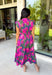 Bring a beautiful blend of color to your fall wardrobe with this eye-catching abstract print midi dress. Designed with a vibrant mix of autumn-inspired hues, this dress offers the perfect balance of playful style and timeless elegance. The flattering v-neckline is accented by a front zipper closure for a modern touch, while the defined waistband and smocked back waist create a comfortable, flattering fit. 