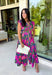 Bring a beautiful blend of color to your fall wardrobe with this eye-catching abstract print midi dress. Designed with a vibrant mix of autumn-inspired hues, this dress offers the perfect balance of playful style and timeless elegance. The flattering v-neckline is accented by a front zipper closure for a modern touch, while the defined waistband and smocked back waist create a comfortable, flattering fit. 