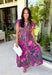 Bring a beautiful blend of color to your fall wardrobe with this eye-catching abstract print midi dress. Designed with a vibrant mix of autumn-inspired hues, this dress offers the perfect balance of playful style and timeless elegance. The flattering v-neckline is accented by a front zipper closure for a modern touch, while the defined waistband and smocked back waist create a comfortable, flattering fit. 