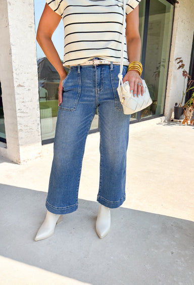 A little retro, a lot of comfort—these medium wash high-rise wide leg jeans from Lovervet are made for effortless fall styling. The high-rise fit flatters your waist, while the wide leg creates a laid-back yet polished silhouette. Oversized pockets add a trendy utility touch, and the soft cotton blend with a hint of stretch keeps them comfortable from morning errands to evening plans. Dress them up or down—either way, they’re a season-to-season keeper.