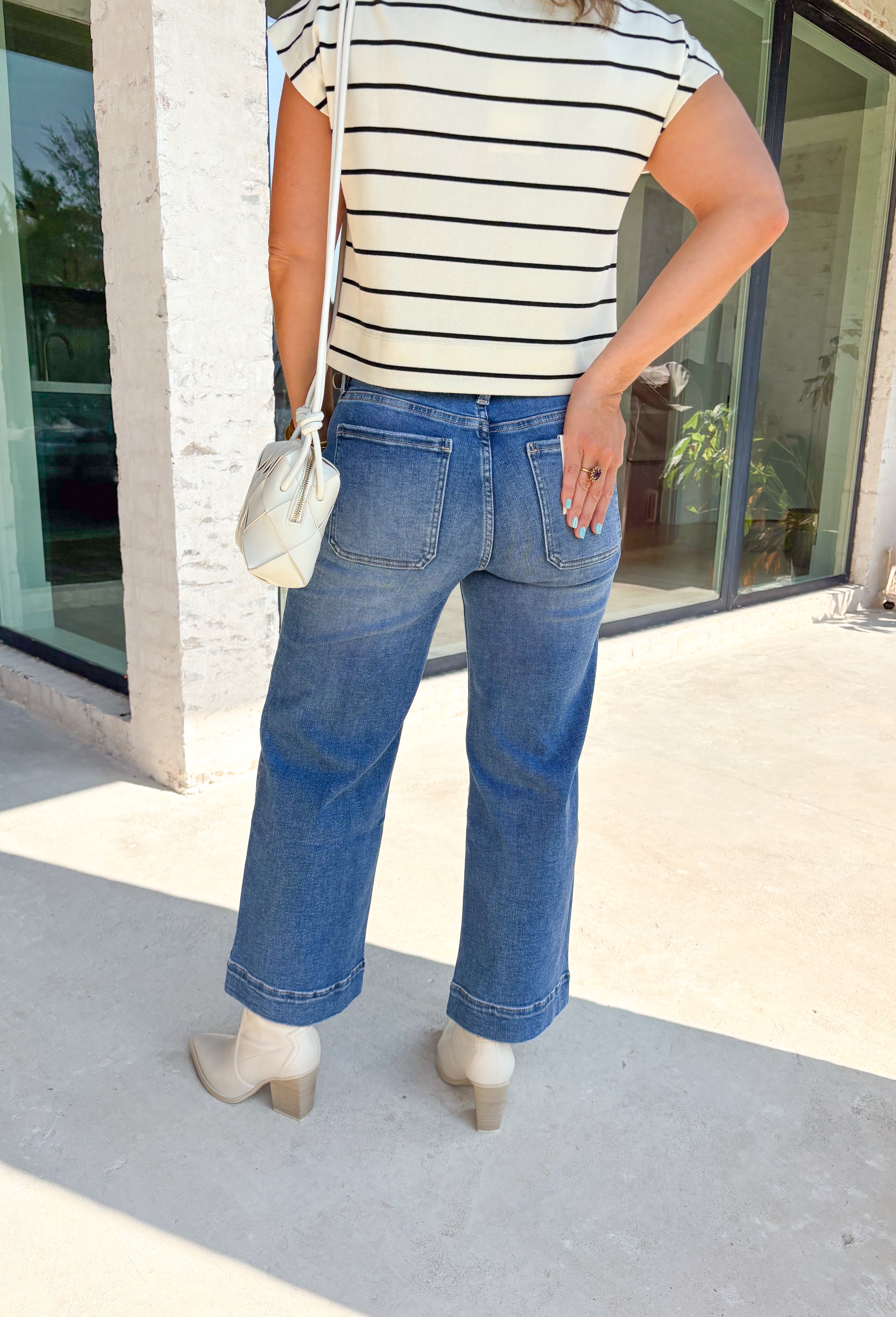 A little retro, a lot of comfort—these medium wash high-rise wide leg jeans from Lovervet are made for effortless fall styling. The high-rise fit flatters your waist, while the wide leg creates a laid-back yet polished silhouette. Oversized pockets add a trendy utility touch, and the soft cotton blend with a hint of stretch keeps them comfortable from morning errands to evening plans. Dress them up or down—either way, they’re a season-to-season keeper.