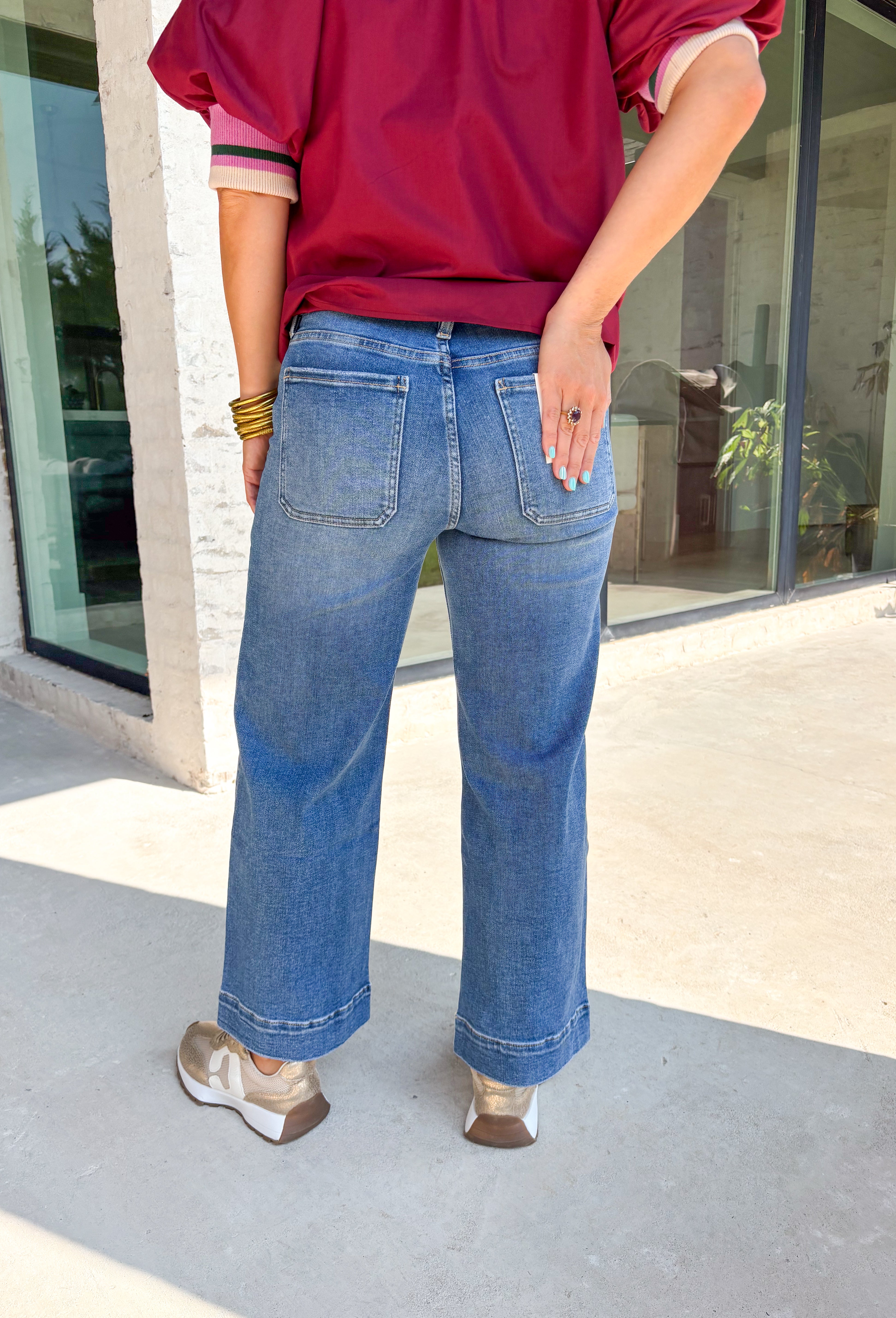 A little retro, a lot of comfort—these medium wash high-rise wide leg jeans from Lovervet are made for effortless fall styling. The high-rise fit flatters your waist, while the wide leg creates a laid-back yet polished silhouette. Oversized pockets add a trendy utility touch, and the soft cotton blend with a hint of stretch keeps them comfortable from morning errands to evening plans. Dress them up or down—either way, they’re a season-to-season keeper.