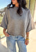 Cozy with a modern edge, this charcoal brown sweater is an easy go-to for cooler days. Designed with a mock neck and cropped length, it’s finished with exposed seam details that add a casual, laid-back vibe. Ribbed cuffs and hem bring structure to the soft knit, while the lightweight blend makes it perfect for layering. A versatile piece that pairs effortlessly with denim, skirts, or wide-leg pants for fall.
