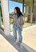 Cozy with a modern edge, this charcoal brown sweater is an easy go-to for cooler days. Designed with a mock neck and cropped length, it’s finished with exposed seam details that add a casual, laid-back vibe. Ribbed cuffs and hem bring structure to the soft knit, while the lightweight blend makes it perfect for layering. A versatile piece that pairs effortlessly with denim, skirts, or wide-leg pants for fall.