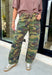 Give your everyday denim collection a bold update with these on-trend camo barrel jeans. Designed in a classic green camouflage print, these statement jeans combine effortless style with all-day comfort for a look that's equal parts laid-back and fashion-forward. The relaxed barrel leg silhouette offers a modern fit you'll love, while the adjustable self-tie belt cinches the waist for a flattering finish. 