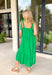 This green midi dress is the perfect combination of playful and polished for summer! The light blue appliqué detail across the front creates a beautiful contrast that instantly catches the eye, while the self-tie shoulder straps add a sweet, feminine touch. Designed with a straight neckline, elastic back, and flowy ruffle hem, it offers a flattering fit that’s as comfortable as it is stylish. Fully lined and finished with side pockets.
