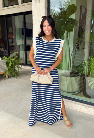 This navy and off white striped maxi dress is the effortless summer staple you'll reach for again and again! The classic stripe print gives it a timeless, coastal-inspired feel, while the contrast rib trim at the neckline and armholes adds a sporty touch. Lightweight and incredibly comfortable, it has that easy throw-on-and-go style that works for everything from vacation days to weekend errands. And with side pockets (always a win), it's as practical as it is cute. 