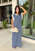 This navy and off white striped maxi dress is the effortless summer staple you'll reach for again and again! The classic stripe print gives it a timeless, coastal-inspired feel, while the contrast rib trim at the neckline and armholes adds a sporty touch. Lightweight and incredibly comfortable, it has that easy throw-on-and-go style that works for everything from vacation days to weekend errands. And with side pockets (always a win), it's as practical as it is cute. 