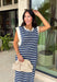 This navy and off white striped maxi dress is the effortless summer staple you'll reach for again and again! The classic stripe print gives it a timeless, coastal-inspired feel, while the contrast rib trim at the neckline and armholes adds a sporty touch. Lightweight and incredibly comfortable, it has that easy throw-on-and-go style that works for everything from vacation days to weekend errands. And with side pockets (always a win), it's as practical as it is cute. 