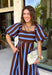 Brown and blue come together in the prettiest way on this striped midi dress from Entro. The scalloped square neckline gives the classic stripe print a sweet, unexpected touch, while short puff sleeves add just the right amount of shape. A smocked back creates a comfortable fit that moves with you, and convenient side pockets make this one even easier to love. 