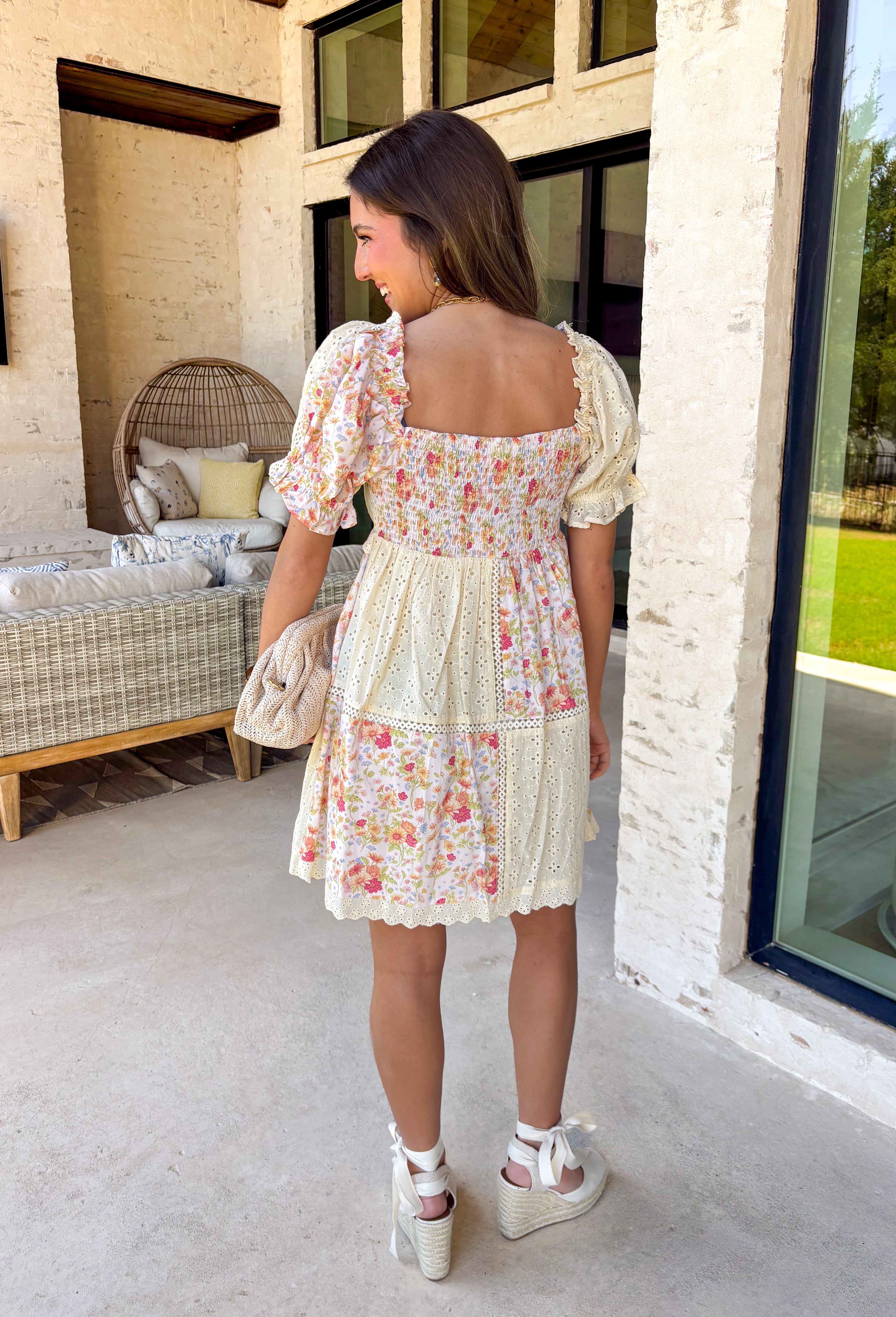 Soft, romantic, and full of spring charm, this neutral color block dress by Heyson is made for sunshine-filled days. Featuring a delicate floral print with pops of pink, blue, orange, and green, this dress feels light, fresh, and feminine. Cream eyelet lace detailing adds a beautiful touch throughout, including the scalloped trim along the v-neckline for an extra layer of texture and charm. 