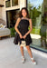 Every closet deserves a timeless little black dress, and this one is sure to become your new favorite! Designed with a flattering straight neckline and chic pleated bodice, this dress offers a polished look that's perfect for any occasion. Adjustable shoulder straps and a smocked back provide a comfortable, customizable fit, while side pockets add the practical detail everyone loves. 