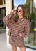 Neutral stripes make this long sleeve top from Day + Moon an easy favorite for the season. The tan base is paired with brown and ivory stripes for a warm color combination that fits right in with your fall wardrobe. Made from a soft cotton blend with a touch of stretch, it offers plenty of comfort for everything from workdays to weekend plans. 