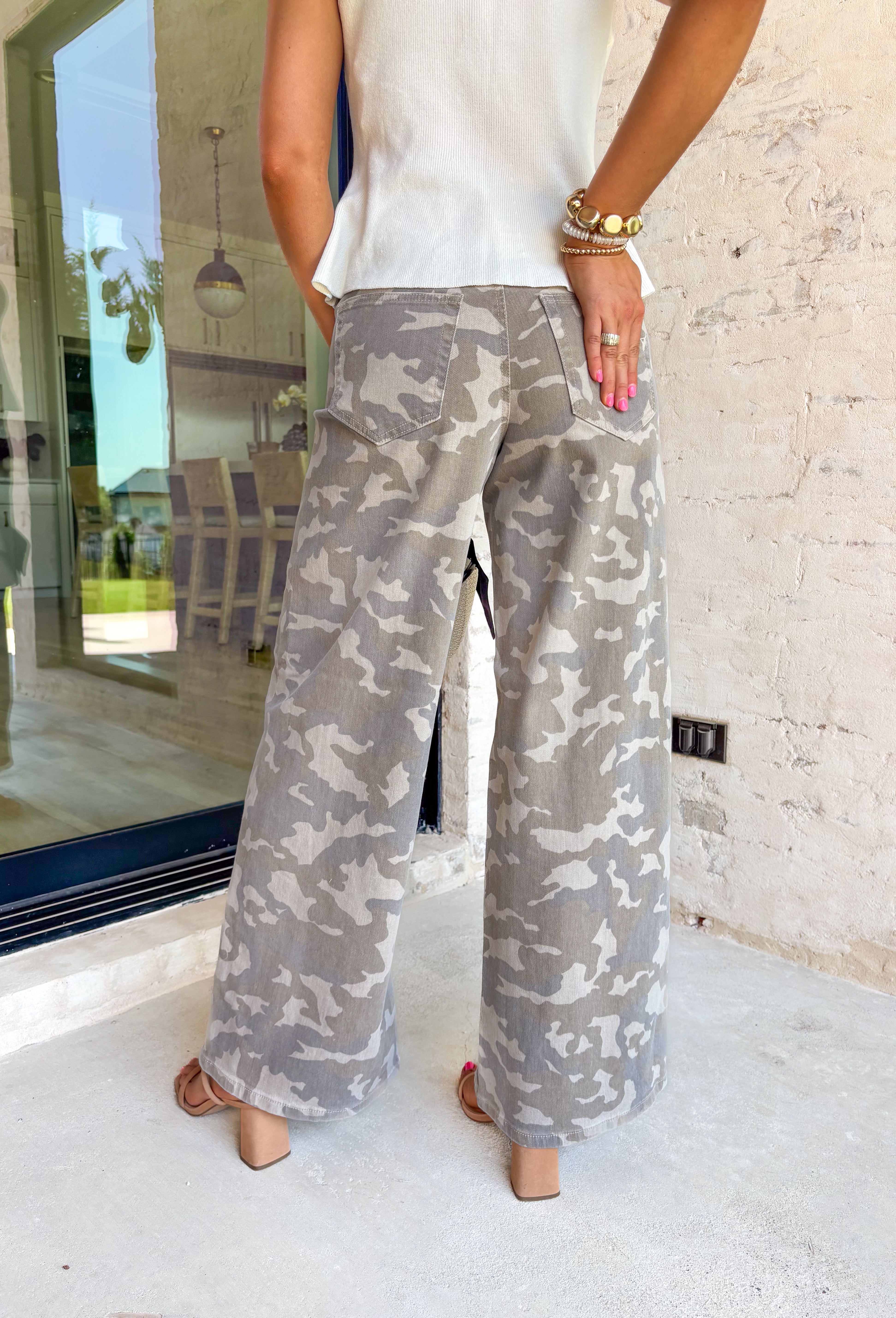 These neutral camo wide leg jeans are the perfect mix of laid-back and statement-making for summer! The neutral camo print keeps them easy to style, while the super wide leg silhouette brings that bold, on-trend look everyone’s loving. Designed with a flattering high-rise fit and just the right amount of stretch, they’re comfortable enough for all-day wear. Pair them with a simple tank or tee and let the jeans do the talking.