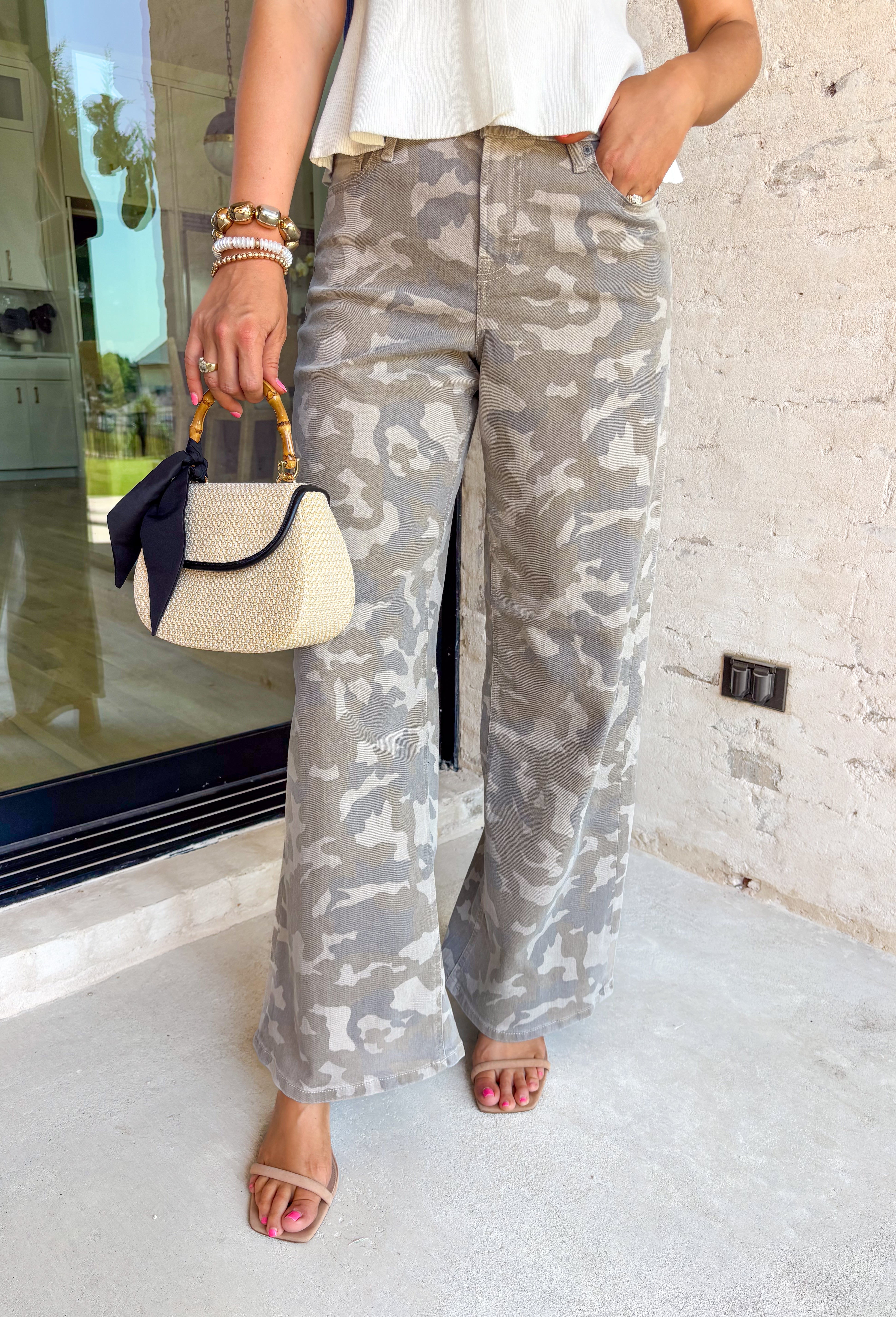 These neutral camo wide leg jeans are the perfect mix of laid-back and statement-making for summer! The neutral camo print keeps them easy to style, while the super wide leg silhouette brings that bold, on-trend look everyone’s loving. Designed with a flattering high-rise fit and just the right amount of stretch, they’re comfortable enough for all-day wear. Pair them with a simple tank or tee and let the jeans do the talking.
