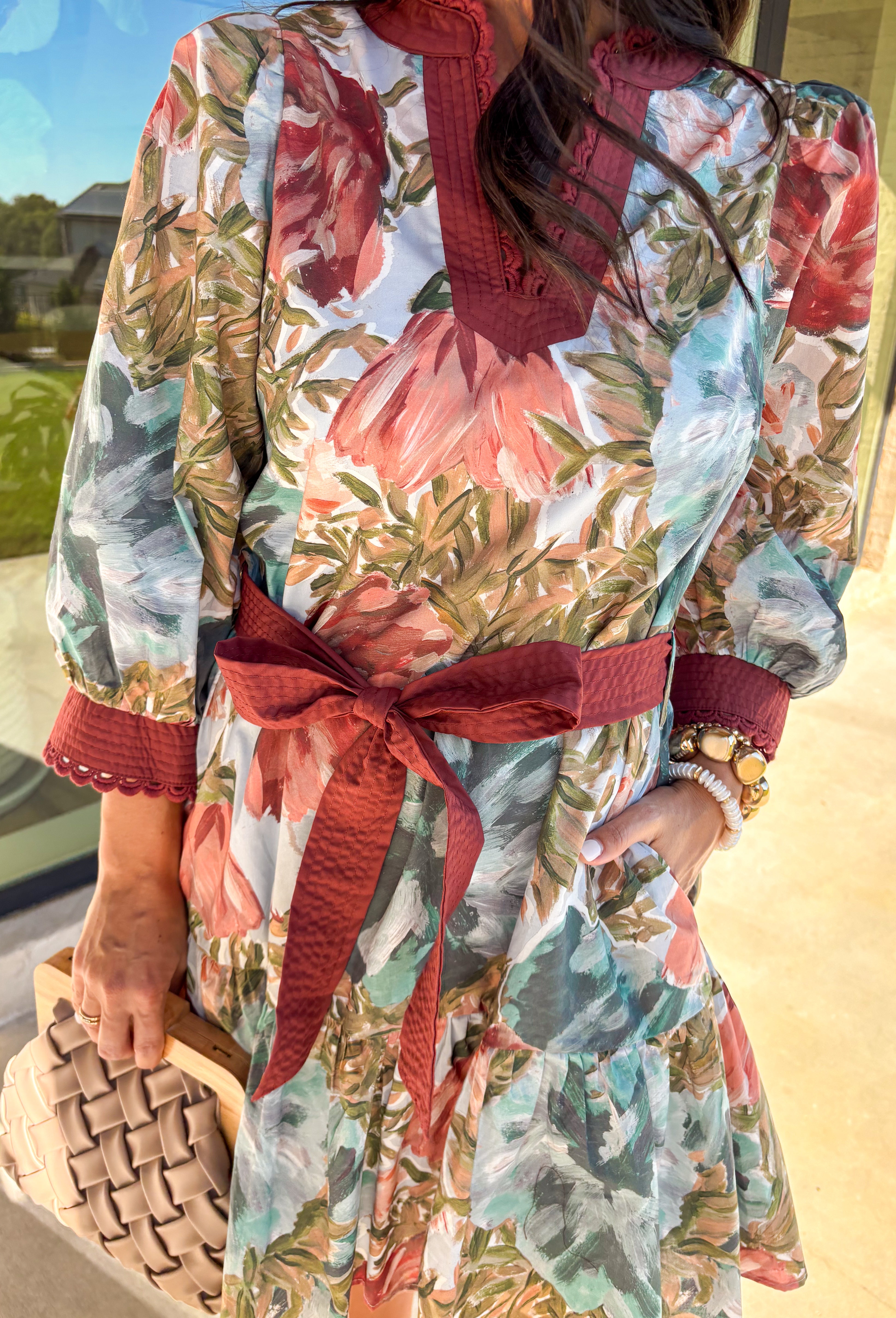 A mix of playful and polished, this dress brings autumn florals to life with a botanical print in rich seasonal shades. The scallop trim along the v-neckline adds a sweet detail, while the self-tie waist belt flatters your shape. Designed with ¾ sleeves, side pockets, and a ruffle hem, it balances comfort and charm. Fully lined for an easy fit, this is a dress you’ll love for everything from casual days to seasonal gatherings.