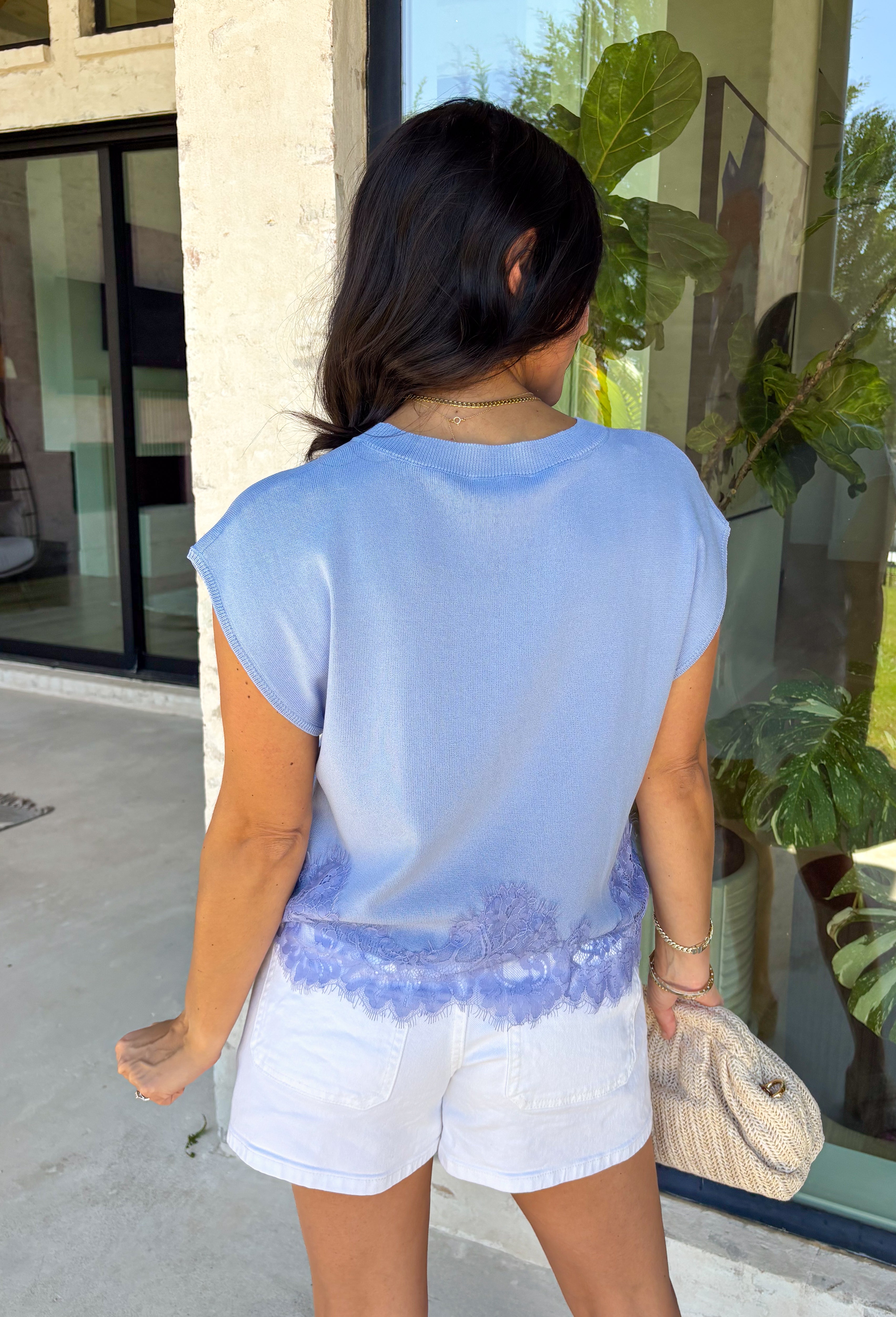 This chambray blue sweater knit top is such a soft, elevated staple for summer! The lightweight knit keeps it breathable while still giving that polished, put-together feel. The cap sleeves add a flattering touch, and the lace trim hem brings in just the right amount of feminine detail to make it feel special. It’s the kind of piece you can easily dress up or keep casual, making it perfect for everything from everyday plans to casual dinners. 