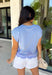 This chambray blue sweater knit top is such a soft, elevated staple for summer! The lightweight knit keeps it breathable while still giving that polished, put-together feel. The cap sleeves add a flattering touch, and the lace trim hem brings in just the right amount of feminine detail to make it feel special. It’s the kind of piece you can easily dress up or keep casual, making it perfect for everything from everyday plans to casual dinners. 