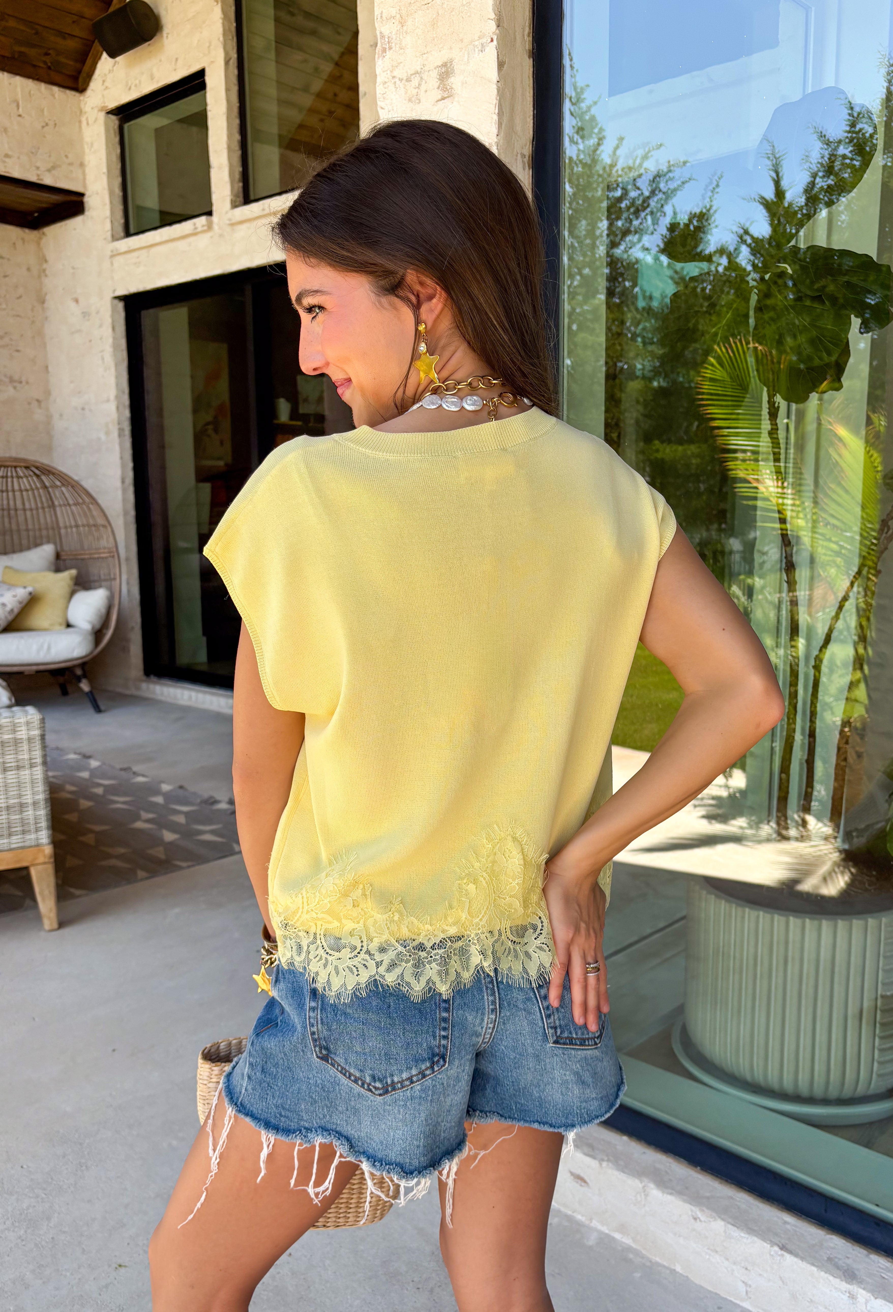 This lemon sweater knit top is such a soft, elevated staple for summer! The lightweight knit keeps it breathable while still giving that polished, put-together feel. The cap sleeves add a flattering touch, and the lace trim hem brings in just the right amount of feminine detail to make it feel special. It’s the kind of piece you can easily dress up or keep casual, making it perfect for everything from everyday plans to casual dinners.