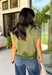 A cozy knit with feminine details is always a fall favorite! This olive short sleeve sweater is the perfect combination of timeless style and everyday comfort. The soft sweater knit feels cozy without being bulky, while the cap sleeves make it ideal for layering under jackets and cardigans throughout the season. Delicate lace trim along the hem adds a beautiful finishing touch, giving this classic piece an elevated feel.