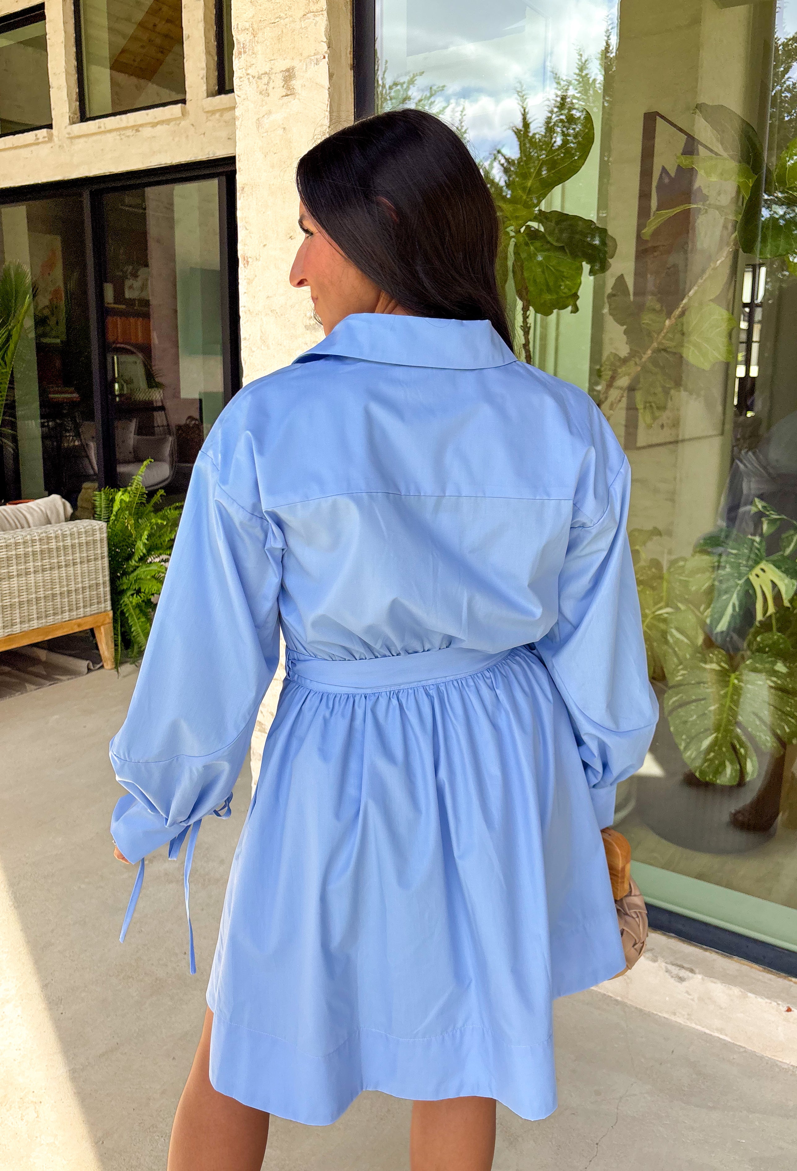 Chic, polished, and effortlessly flattering! This light blue long sleeve wrap dress is the perfect blend of tailored and feminine. Designed with a notched collar and a unique gold button front detail, it brings a refined touch to a classic silhouette. The self-tie wrap closure cinches at the waist to create a beautiful, adjustable fit, while the structured shape keeps it looking crisp and put together. 