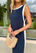 Sleek, simple, and effortlessly chic, this navy sleeveless midi dress by Entro is a fresh spring staple you’ll wear on repeat. Designed with crisp white contrast binding along the neckline, armholes, and hem, it offers a polished look with just the right amount of edge. A side slit adds easy movement, while the lightweight, soft fabric blend keeps it comfortable for warm spring days and breezy evenings.
