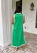 Sleek, simple, and effortlessly chic, this green sleeveless midi dress by Entro is a fresh spring staple you’ll wear on repeat. Designed with crisp white contrast binding along the neckline, armholes, and hem, it offers a polished look with just the right amount of edge. A side slit adds easy movement, while the lightweight, soft fabric blend keeps it comfortable for warm spring days and breezy evenings.