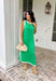 Sleek, simple, and effortlessly chic, this green sleeveless midi dress by Entro is a fresh spring staple you’ll wear on repeat. Designed with crisp white contrast binding along the neckline, armholes, and hem, it offers a polished look with just the right amount of edge. A side slit adds easy movement, while the lightweight, soft fabric blend keeps it comfortable for warm spring days and breezy evenings.