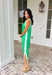 Sleek, simple, and effortlessly chic, this green sleeveless midi dress by Entro is a fresh spring staple you’ll wear on repeat. Designed with crisp white contrast binding along the neckline, armholes, and hem, it offers a polished look with just the right amount of edge. A side slit adds easy movement, while the lightweight, soft fabric blend keeps it comfortable for warm spring days and breezy evenings.